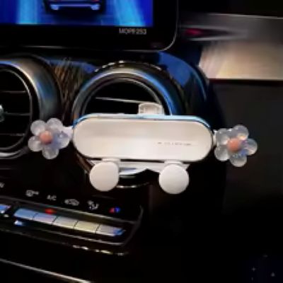 support téléphone voiture avec fleurs blanche